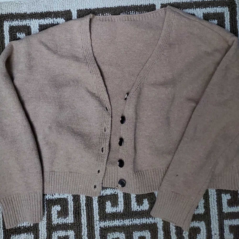 Brown cardigan.